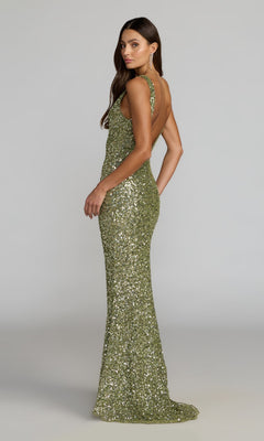 A woman stands sideways against a plain gray background, wearing the Mac Duggal 5185 long formal dress—a sleeveless, backless, floor-length gown adorned with green sequins.