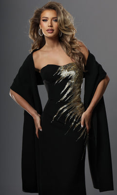 A woman poses against a neutral background wearing the Jovani 51900 long formal dress—a fitted sheath silhouette black strapless gown featuring gold sequin embroidery accents—styled with a matching black shawl draped over her arms.