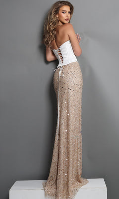 A woman stands on a platform, posing against a plain gray background while wearing the Long Formal Dress: Jovani 51916, featuring a strapless white corset bodice top and a long, gold sequin sheath skirt.