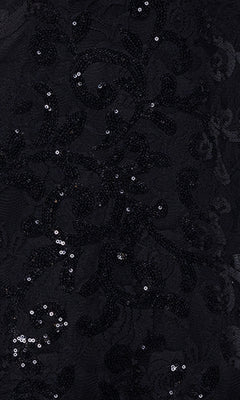 Close-up of black fabric with embroidered florals and scattered sequins, creating a subtle shine—ideal for a sheer corset bodice on the Black Sequin-Print Prom Dress: Blondie Nites 5213BN.