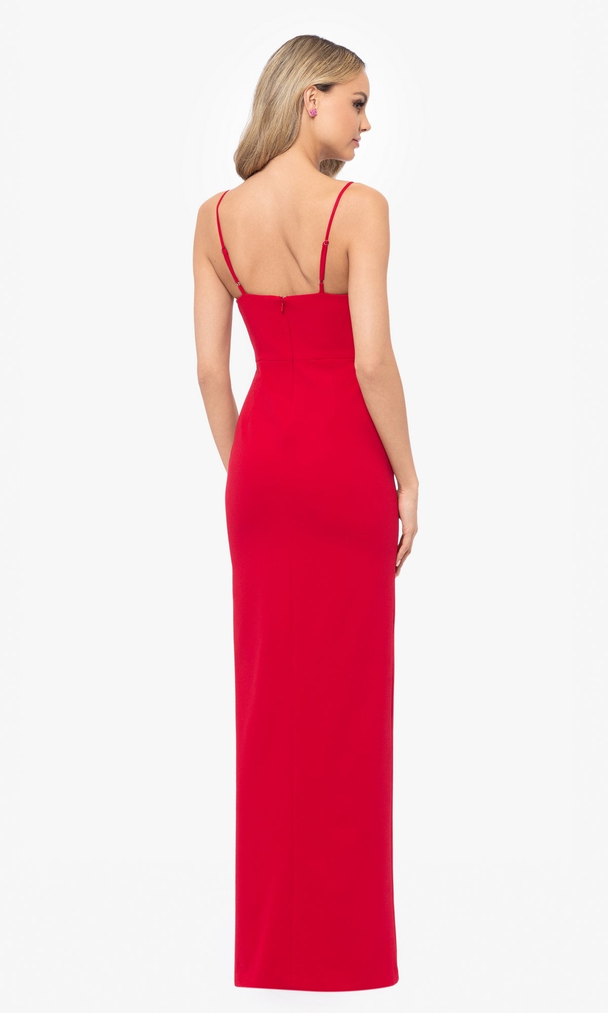 Model showcases the Rosette Long Red Prom Dress (Blondie Nites 5218BN) with thin shoulder straps, viewed from the back against a plain white background.