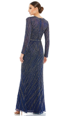 A woman stands with her back turned, wearing the Mac Duggal 5240: a navy blue long sleeve formal dress with a high neckline, floor-length silhouette, and shimmering diagonal sequin embellishments.