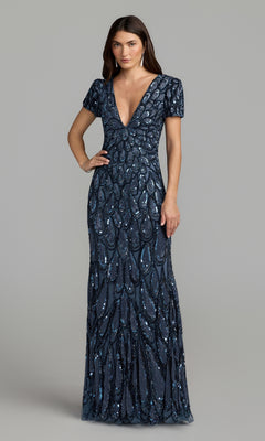 A woman wearing the Mac Duggal 5243 Sequin Long Formal Dress in denim, a floor-length gown with short sleeves and a deep V-neckline, featuring an intricate sequin pattern, stands against a plain background.