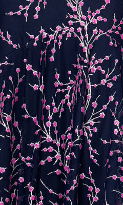 The Navy Blue Print Prom Dress: Blondie Nites 5273BN features navy blue fabric with pink and white cherry blossom embroidery—ideal for a navy blue prom dress or a unique pink floral prom look.