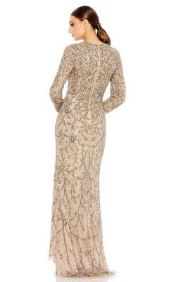 A woman stands with her back to the camera in the Long Formal Dress 5308 by Mac Duggal, a floor-length beige gown with long sleeves, detailed beadwork, and elegant embroidery.