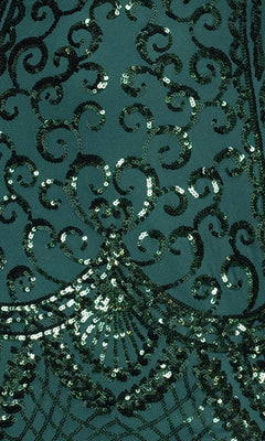 Close-up of dark green fabric with intricate, shimmering sequin designs—ideal for creating a standout look with the Long Sequin-Print Prom Dress: Blondie Nites 5377BN.