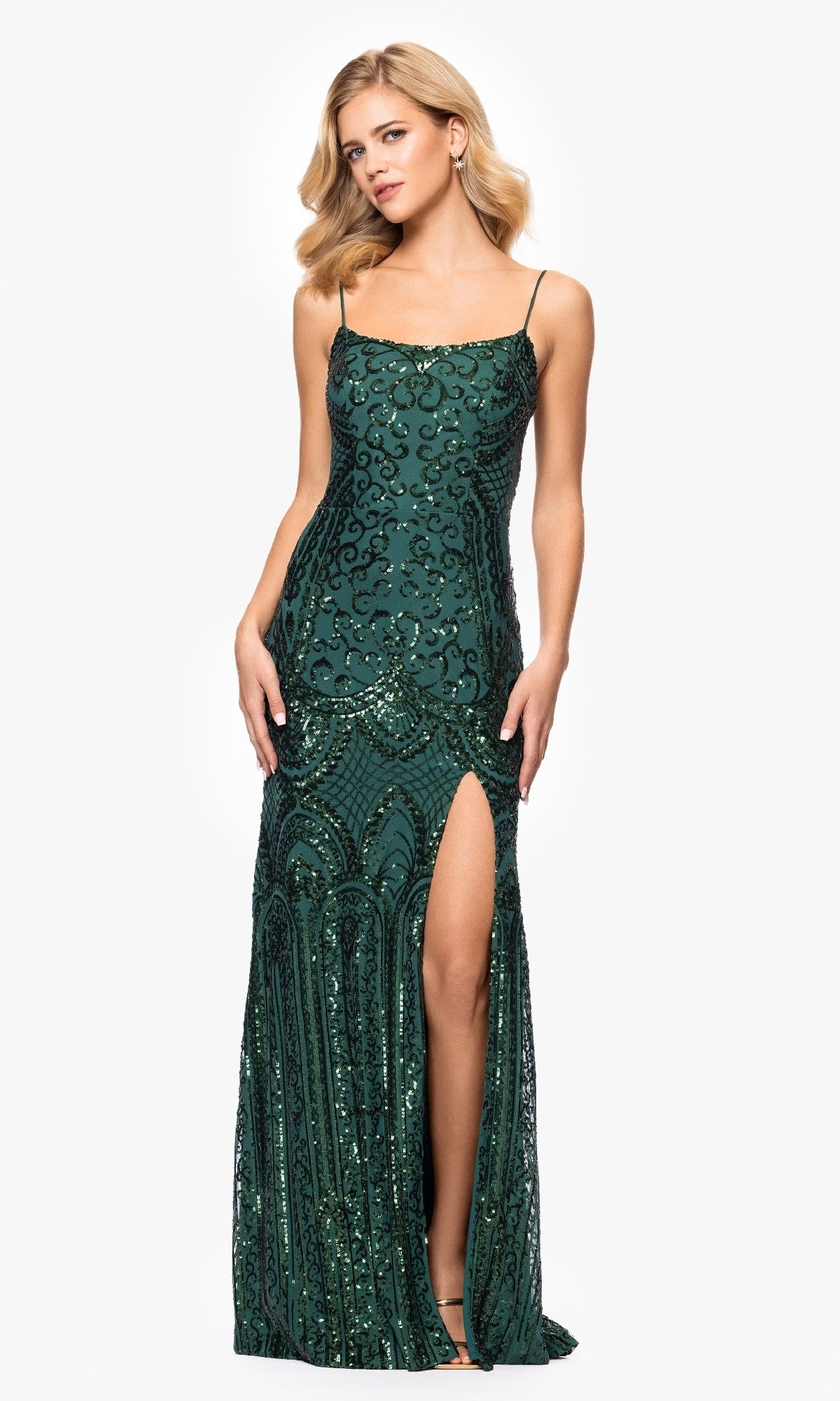 A woman wears the Blondie Nites 5377BN long sequin-print prom dress with spaghetti straps and a thigh-high slit, posing against a plain white background.