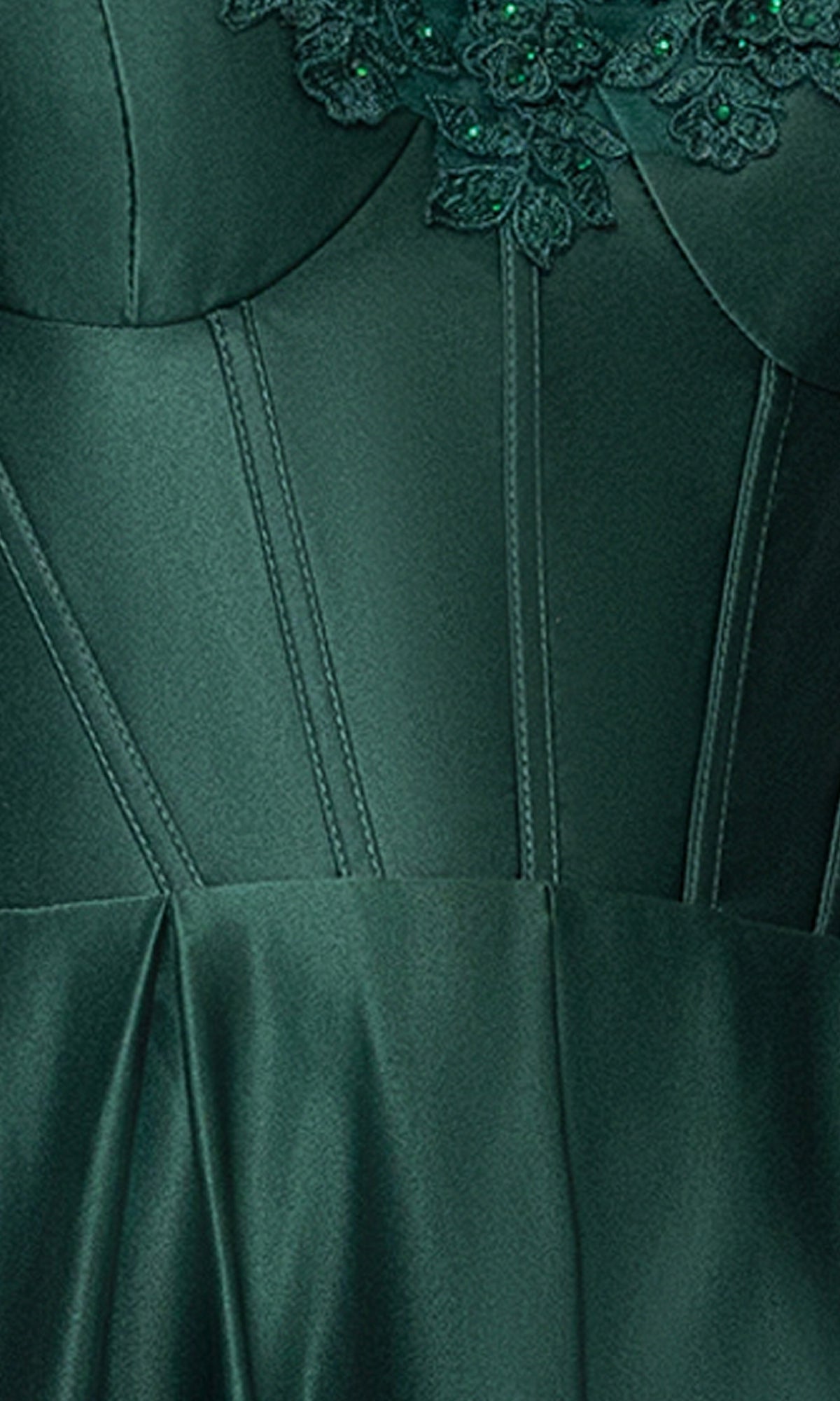 Close-up of the Classic Long Prom Dress: Blondie Nites 5387BN in dark green satin, featuring a sweetheart neckline, vertical stitching, and delicate floral lace embroidery near the neckline.