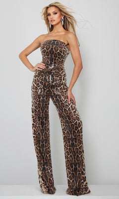 A woman poses in the Long Formal Jumpsuit: Jovani 54171, featuring a strapless, sequined design with an eye-catching animal print, set against a plain light background.