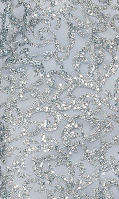 Close-up of shimmering green sequin embroidery in swirling, floral-like patterns on the Long Green Sequin Prom Dress: Blondie Nites 5472BN, evoking elegant evening gown detailing.
