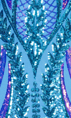 Close-up of the Long Blue Sequin Prom Dress (Blondie Nites 5493BN) fabric, highlighting its intricate, symmetrical aqua blue sequin patterns and shimmering light reflections.