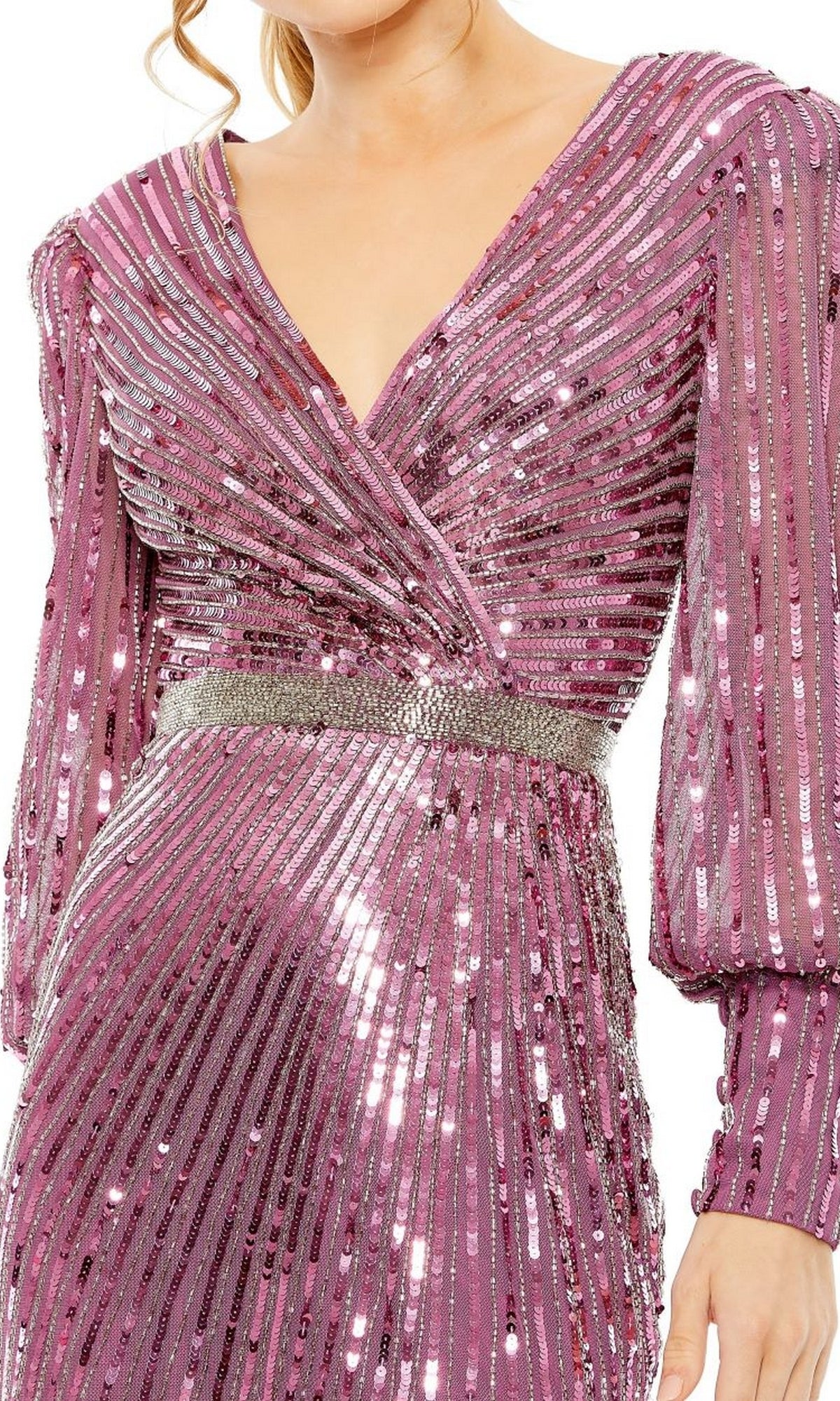 A person wearing the Mac Duggal 5501: a pink long sleeve sequin formal dress with a V-neck and silver waistband, ideal for a mother of the bride.