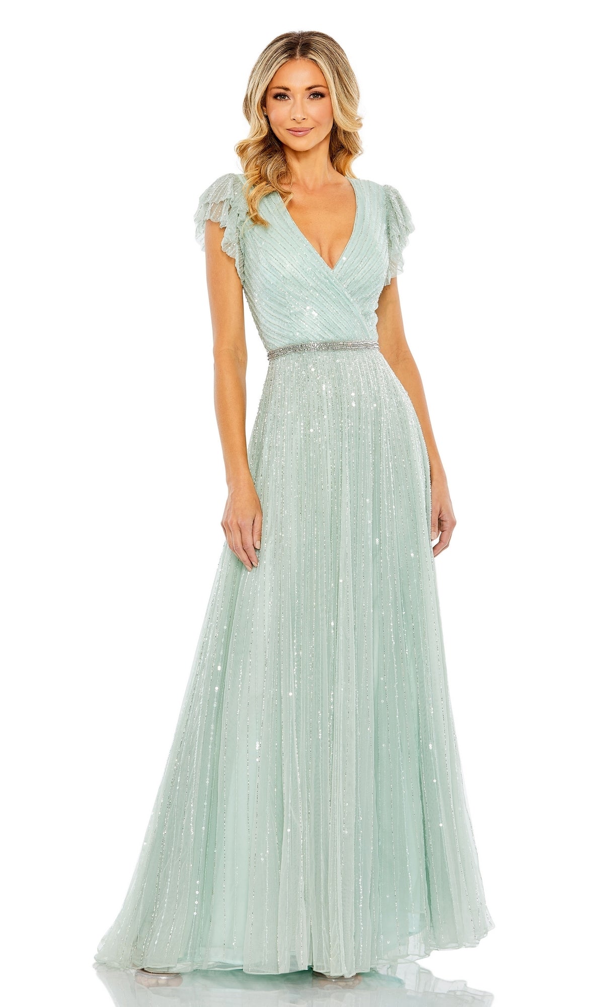 A woman stands facing forward in a light blue Mac Duggal 5502 Sequin-Stripe Long Formal Dress, featuring a floor-length v-neck design, short flutter sleeves, and a fitted sequined waistline.