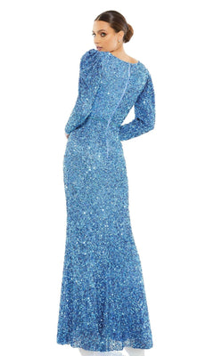 Woman shown from the back wearing the Mac Duggal 5510 Long Sleeve Sequin Formal Dress, a fitted, floor-length blue gown, against a plain white background.