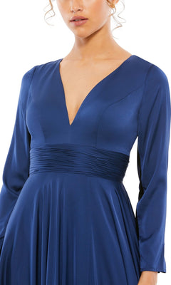 Woman in a long sleeve blue satin Mac Duggal 55245 formal dress, featuring a deep V-neck, fitted waist, and pleated A-line evening gown skirt.