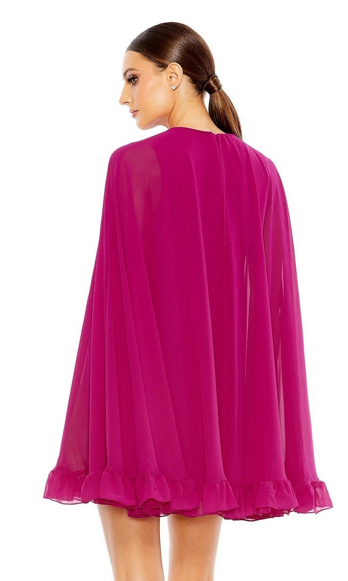 A woman with brown hair in a low ponytail is seen from behind wearing the Mac Duggal 55407 Cape-Sleeve Short Ruffled Party Dress in bright magenta—its sheer fabric and ruffled hem make it a chic choice for cocktail parties.