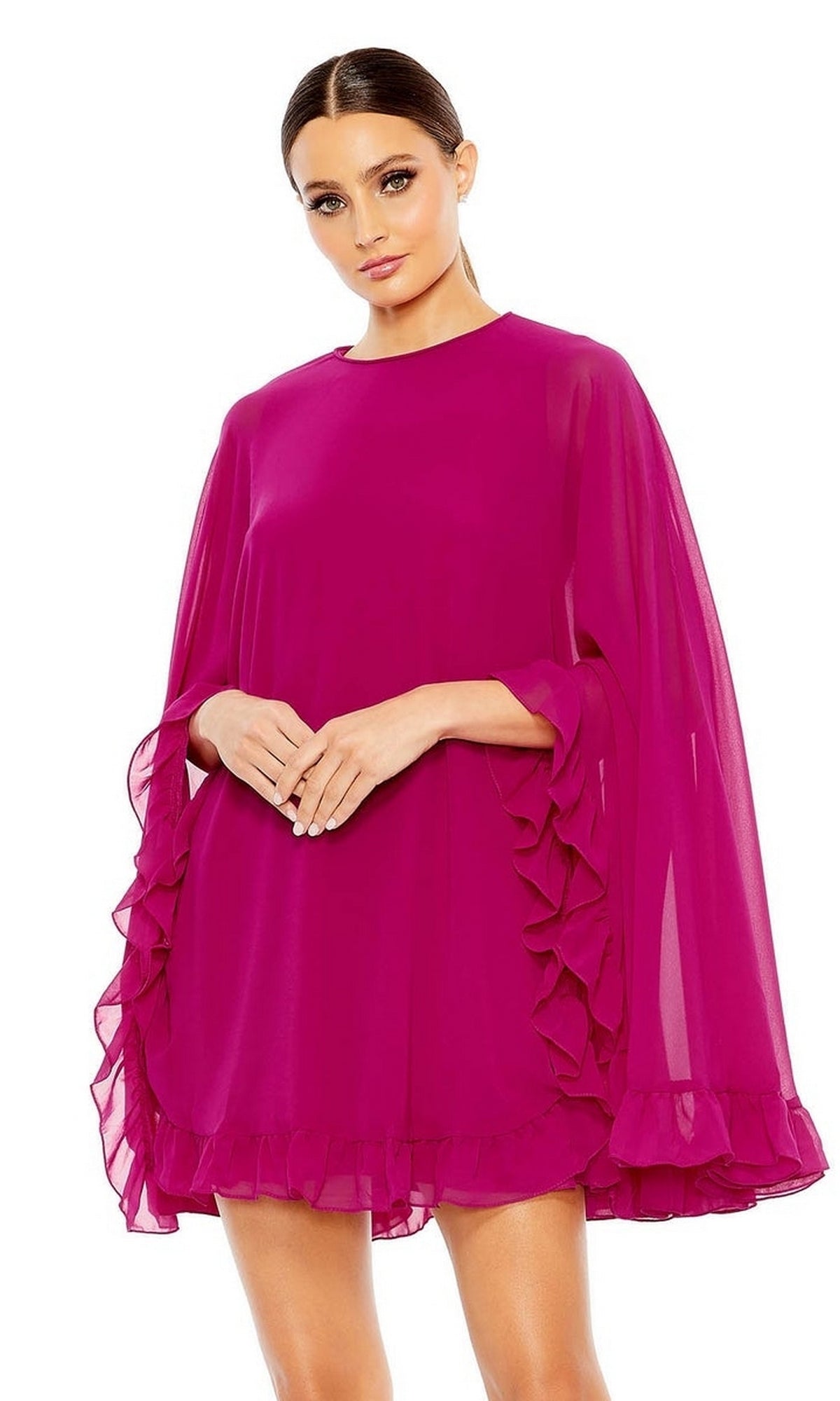 A woman models the Cape-Sleeve Short Ruffled Party Dress: Mac Duggal 55407— a magenta mini with sheer, ruffled cape sleeves—against a white background. Perfect for semi-formal cocktail events.