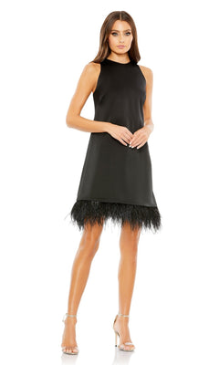 Woman in the Mac Duggal 55805 Short Sheath Wedding Guest Dress—sleeveless, black with a feathered trim hemline—styled with silver high-heeled sandals against a white background; an elegant choice for any wedding guest.