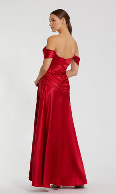 A woman faces away from the camera in the elegant Mac Duggal 56037, an off-the-shoulder, floor-length red satin prom dress, shown against a plain light background.