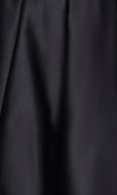 A close-up highlights the soft folds and matte texture of the Cut-Out Black Mini Hoco Dress: Blondie Nites 5605BN, showcasing its elegant black design for homecoming.