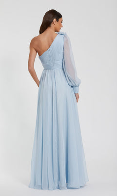 A woman is shown from the back in a light blue, one-shoulder Mac Duggal 56070 formal dress with a sheer long sleeve against a plain white background. This elegant gown radiates sophistication and style.