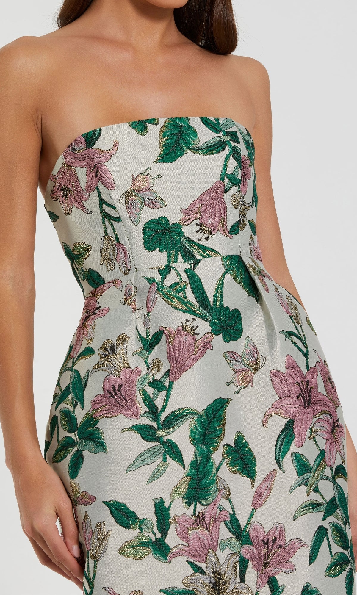 Woman wearing the Midi Floral Wedding Guest Dress: Mac Duggal 56097—strapless, white with pink and green floral print, shown from shoulders to hips—an ideal choice for a chic wedding guest look.