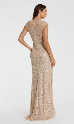 A woman is shown from the back with her hand on her hip, wearing the Mac Duggal 5619 Sleeveless Beaded Long Formal Dress against a plain background.