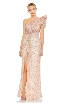 A woman wears the Mac Duggal Long Formal Dress 5622—a blush, fitted, one-shoulder gown featuring sequin embellishments, a ruched bodice, and a high slit.