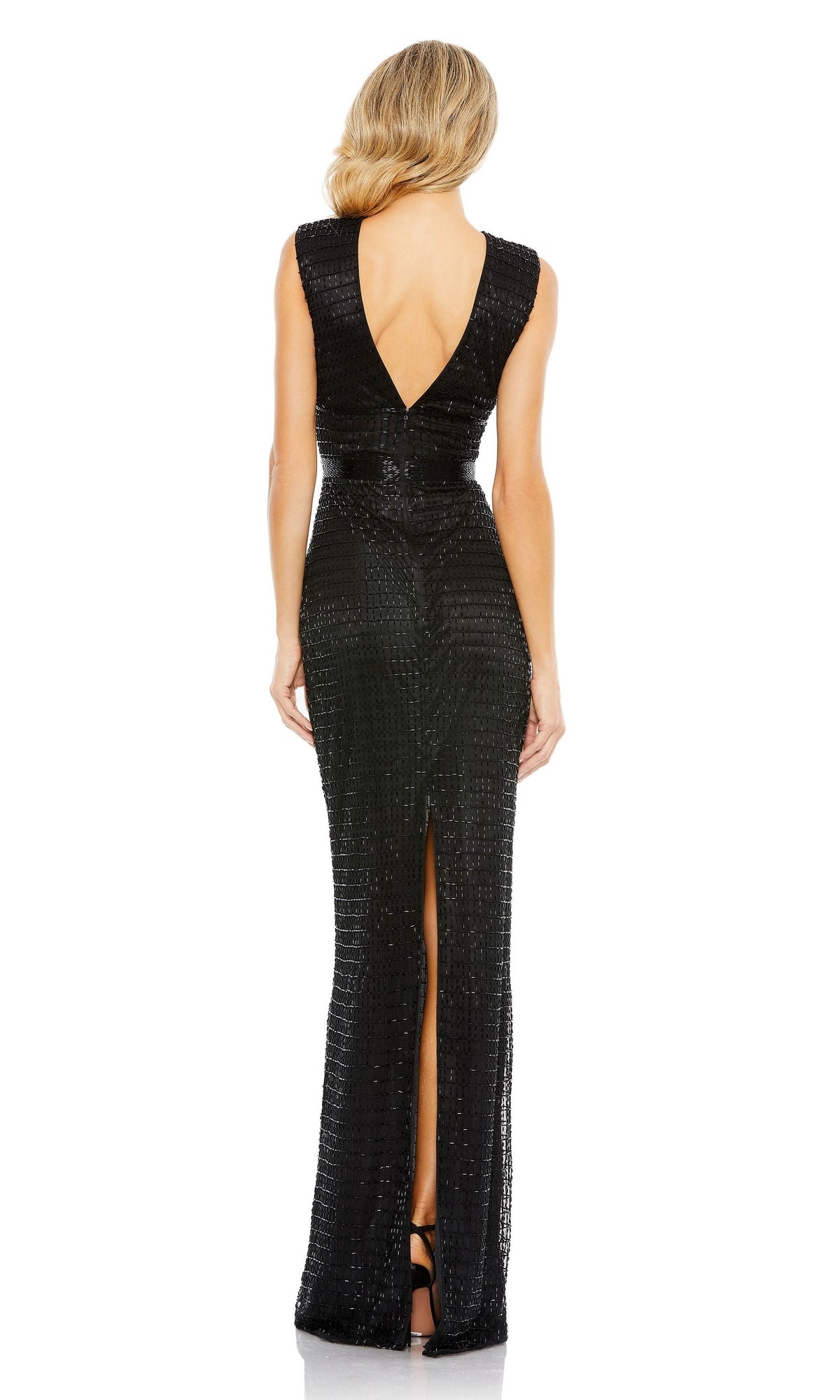 A woman faces away from the camera, wearing the Mac Duggal 5625 V-Neck Long Beaded Formal Dress—sleeveless, floor-length, with a deep V back and high slit—posed against a white background.