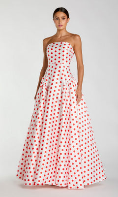 A woman wearing the Long Formal Dress: Mac Duggal 56283 in White Multi stands against a plain light background.