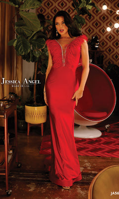 A woman wears the Feather-Trimmed Long Formal Dress: Jessica Angel 566, standing indoors by a modern chair and large plant, with retro decor touches in the background.