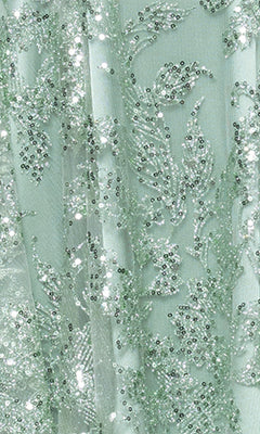 Close-up of the Mini Green Sequin Hoco Dress: Blondie Nites 5705BN, showing sage green fabric with intricate embroidery and sparkling sequins in a leafy design.