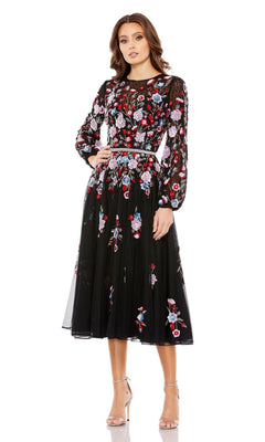 Woman models the Short Semi-Formal Dress 5712 by Mac Duggal—an effortlessly chic black long sleeve dress featuring colorful floral embroidery, perfect for a stylish semi-formal look.