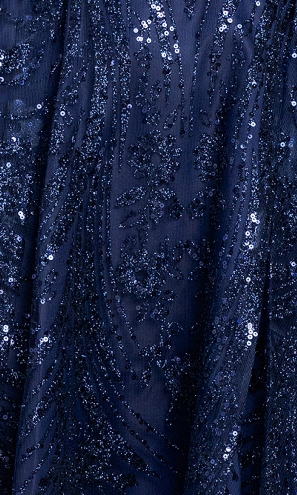 Close-up of the Cowl-Neck Short Hoco Dress: Blondie Nites 5713BN in dark blue shows sequin and glitter patterns, creating a sparkling, textured look perfect for your next homecoming.