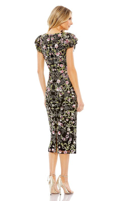 Woman standing and facing away, wearing the Mac Duggal 5722 knee-length sequin party dress with short ruffled sleeves, paired with metallic heels.