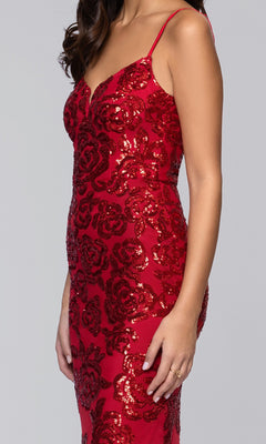 A woman models the Blondie Nites 5905BN long prom dress, a sleeveless, form-fitting red gown with sequin floral patterns, shown from shoulders to knees against a plain background.
