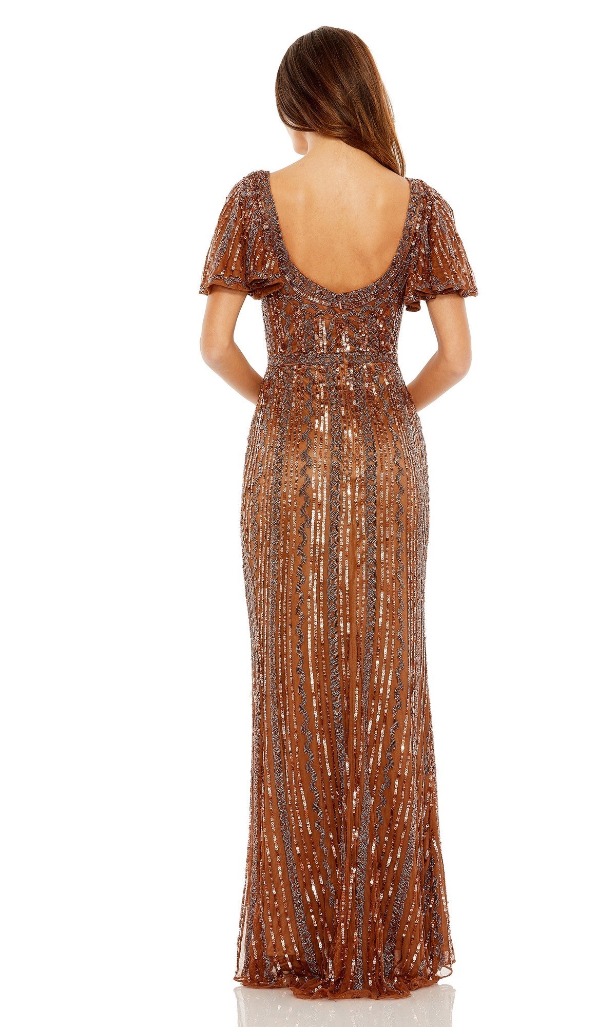 A woman faces away, wearing the Mac Duggal 5914 long formal dress—a floor-length, short-sleeve copper sequin evening gown featuring a low scoop back.