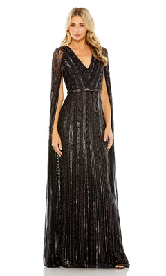 A woman stands facing forward against a plain white background, wearing the Long Formal Dress 5915 by Mac Duggal, featuring black sequins, a v-neckline, and sheer floor-length cape sleeves.