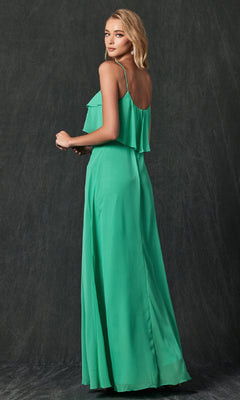 A woman poses in the Juliet 591, a sleeveless, floor-length green wedding-guest dress with a pop-over bodice, set against a dark, textured background.