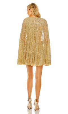 A woman faces away in the Short Gold Beaded Cocktail Dress: Mac Duggal 5931 with cape sleeves and metallic high heels, set against a white background.