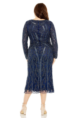 A woman stands facing away in the Plus Size Wedding Guest Dress 5938 by Mac Duggal—a navy blue, beaded midi dress with long sleeves and intricate lace detail, paired with nude heels.