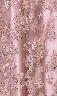 Close-up of pink satin fabric from the Blondie Nites 6007BN long prom dress, featuring a glitter-mesh butterfly pattern with floral embroidery, sequins, and beads for a sparkling corset bodice effect.