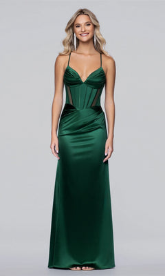 A woman faces forward, wearing the Blondie Nites 6014BN long prom dress in hunter—a floor-length, fitted satin gown with thin straps and a structured corset bodice, set against a plain background.