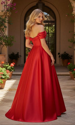 A woman with long blonde hair stands outside, facing away from the camera, wearing the Long Prom Dress: Blondie Nites 6019BN. Potted plants and an arched doorway are visible in the background.