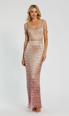A woman stands against a plain light background wearing the Fringed Pink Ombre Formal Dress: Mac Duggal 6032, a sleeveless, floor-length gown with shimmering pink and gold layers and beaded fringe details.