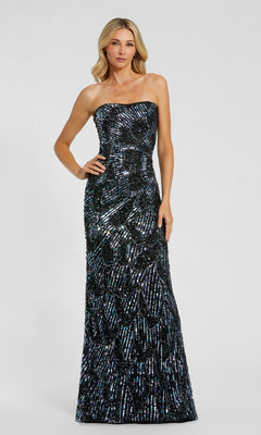 A woman wearing the Long Formal Dress: Mac Duggal 6046 in Black Multi—a strapless, floor-length column gown embellished with silver sequin details—stands against a plain light background.