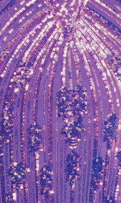 Close-up of the Blondie Nites 6048BN long prom dress in purple, featuring shiny sequins arranged in curved and vertical lines with clusters to create a decorative pattern.