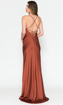 A woman wears the Cowl-Neck Sleek Long Satin Prom Dress 6111, featuring thin straps and a crisscross open back, standing against a plain white background.