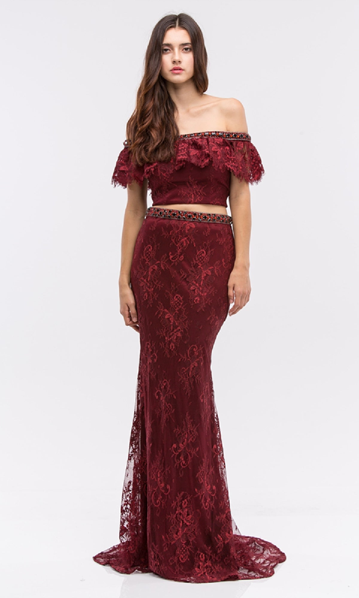 A woman stands facing forward in the Eureka 6113, a burgundy off-the-shoulder lace long formal dress with a fitted mermaid silhouette and floor-length hem, set against a plain white background.