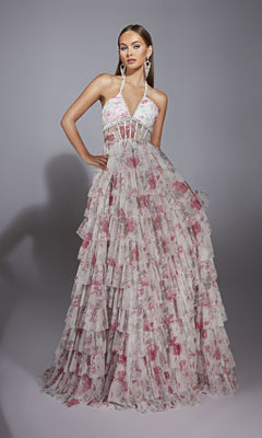 Model wearing the Alyce 61730 Ruffled Long Print Prom Dress, a sleeveless halter-neck gown with a tiered ruffled skirt and pink floral print, styled as a stunning floor-length evening look against a plain gray background.